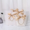 로고 라이트 그린 화장용 쇼핑 가방 나비 넥타이 리본 하얀 선물 가방에 날인하기